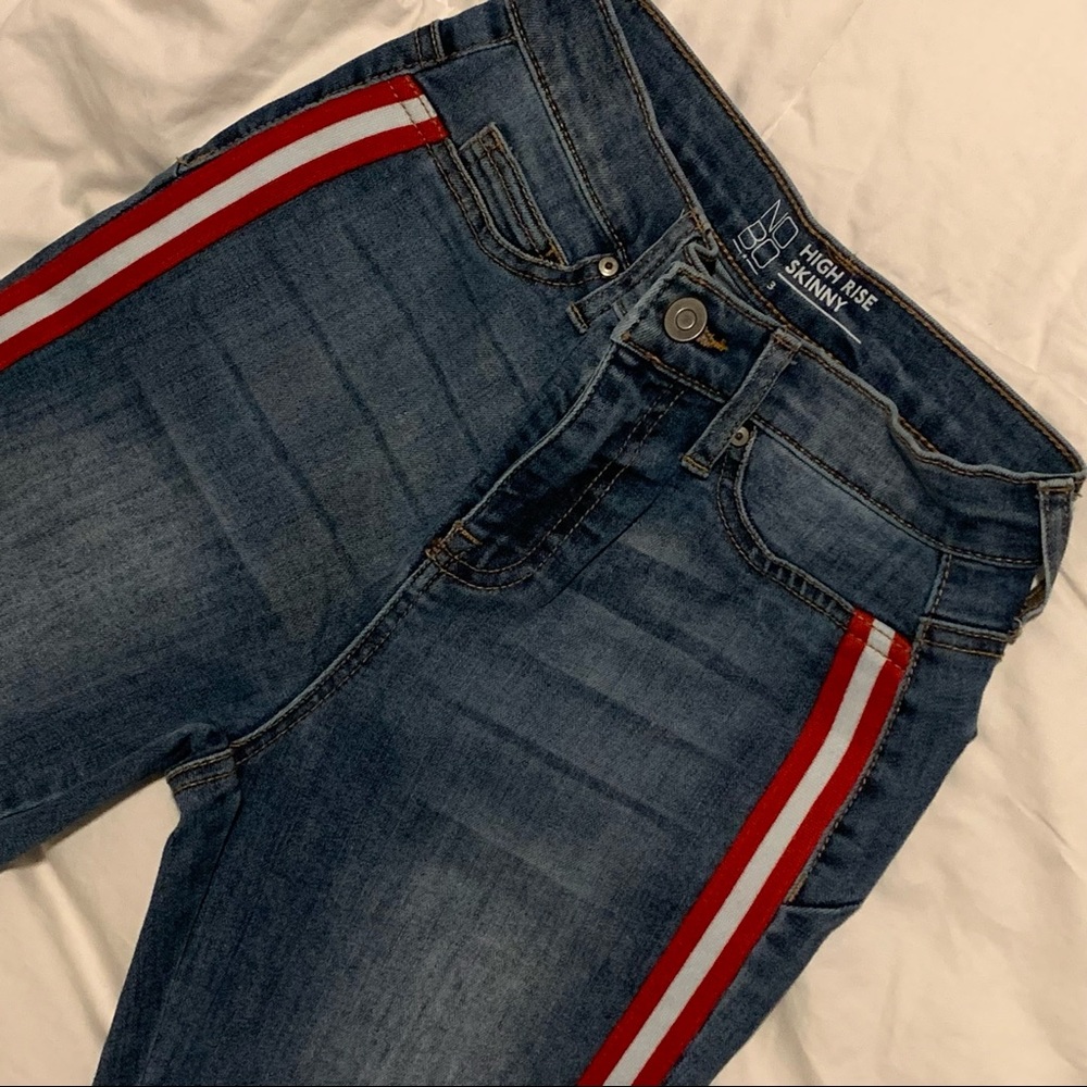 Jeans | Blue with red and white stripes.